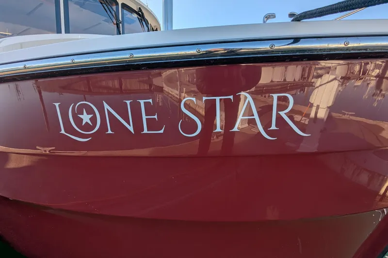 Lone Star Yacht Photos Pics Red Ranger Tugs R-31 S boat named "Lone Star," 2022 model.