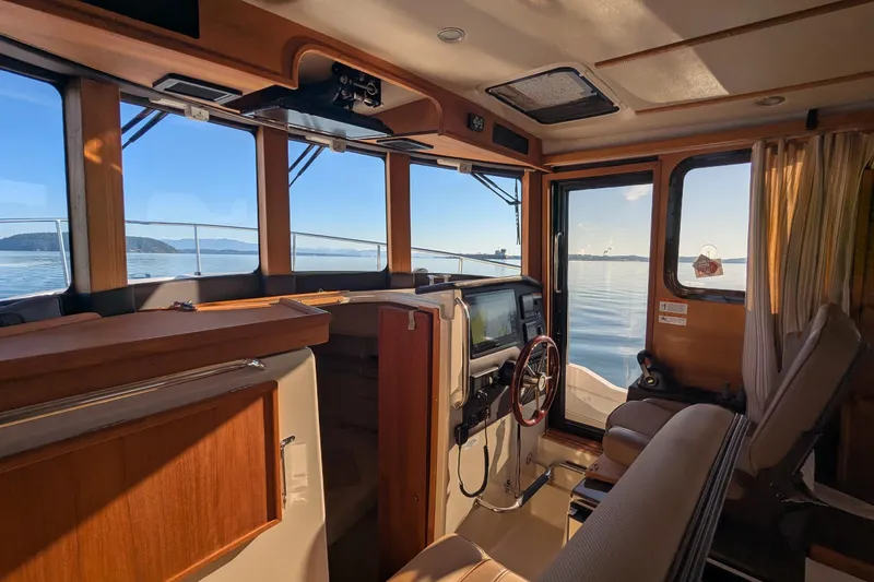 Lone Star Yacht Photos Pics Interior of 2022 Ranger Tugs R-31 S boat with scenic ocean view.
