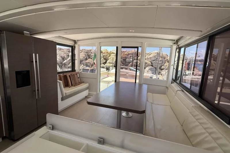 Raf IV Yacht Photos Pics Luxurious interior of 2020 Bali 4.3 catamaran with modern seating and large windows.