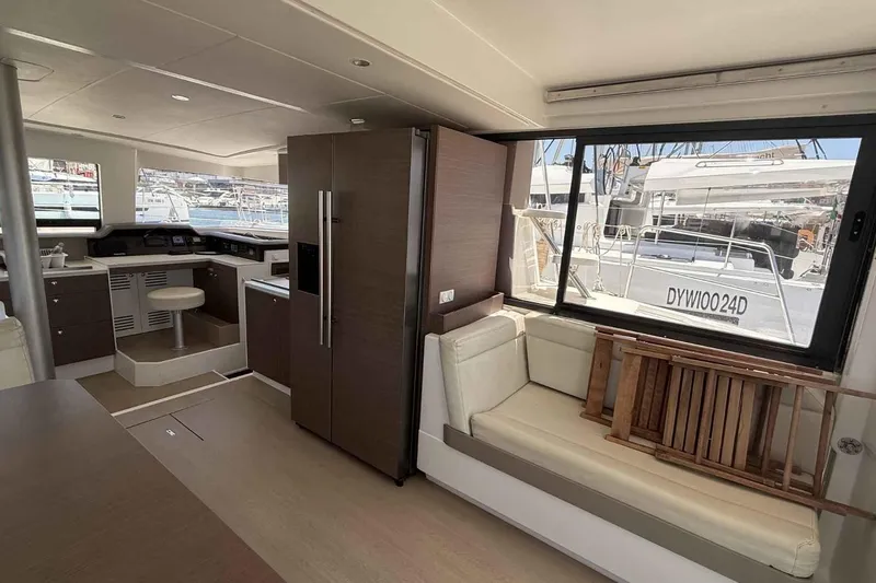 Raf IV Yacht Photos Pics Interior of 2020 Bali 4.3 yacht with modern kitchen and seating area.