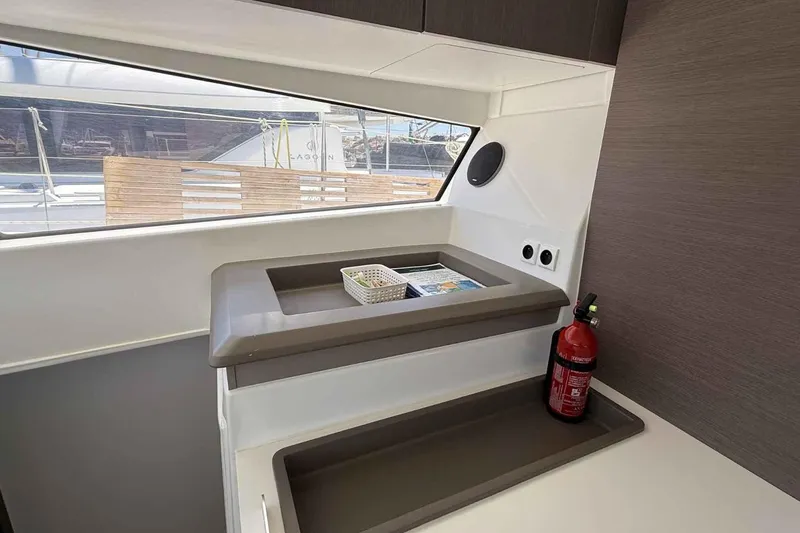 Raf IV Yacht Photos Pics Interior of 2020 Bali 4.3 yacht with window, storage, and fire extinguisher.