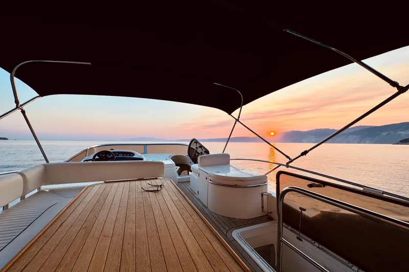  Yacht Photos Pics Sunseeker Manhattan 56 yacht at sunset, 2004 model, with ocean view.