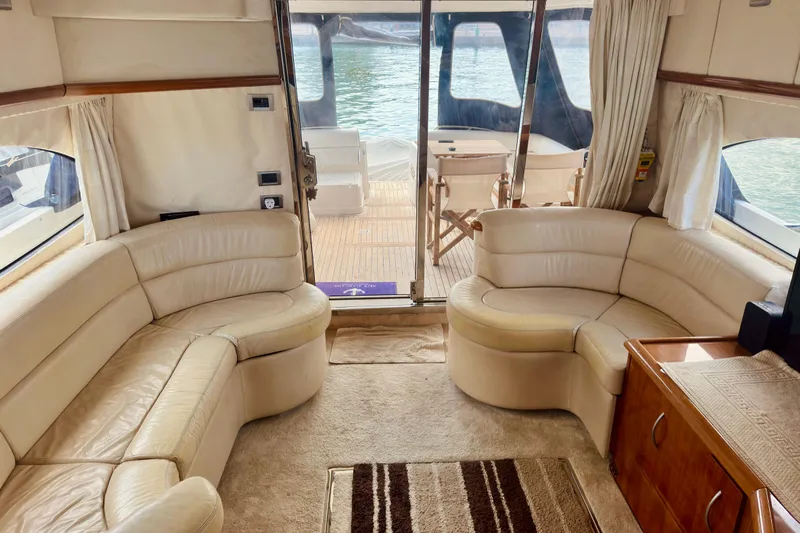  Yacht Photos Pics Luxurious interior of 2004 Sunseeker Manhattan 56 yacht with cream leather seating.