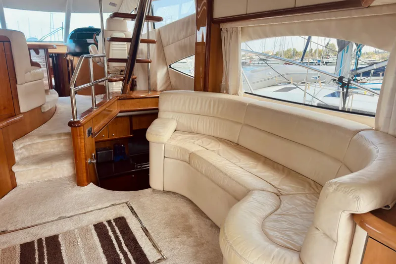  Yacht Photos Pics Luxurious interior of 2004 Sunseeker Manhattan 56 yacht with cream leather seating.