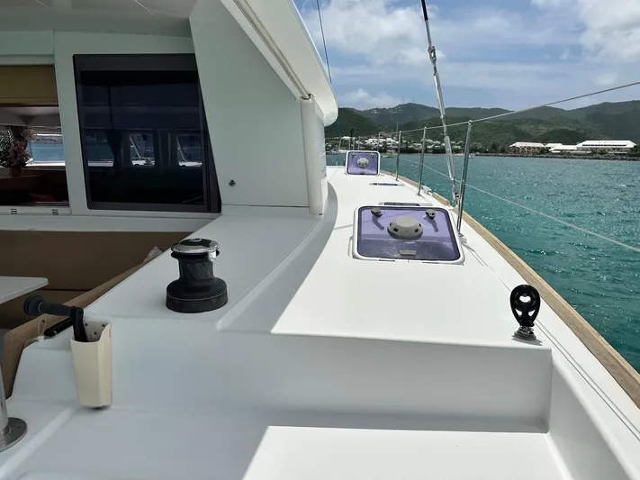  Yacht Photos Pics 2014 Lagoon 400 S2 catamaran deck with ocean view and clear sky.
