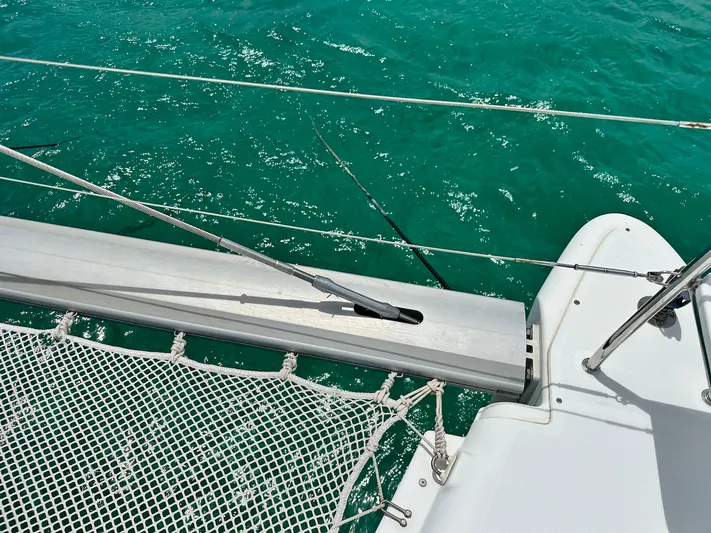  Yacht Photos Pics Deck view of 2014 Lagoon 400 S2 catamaran on turquoise water.