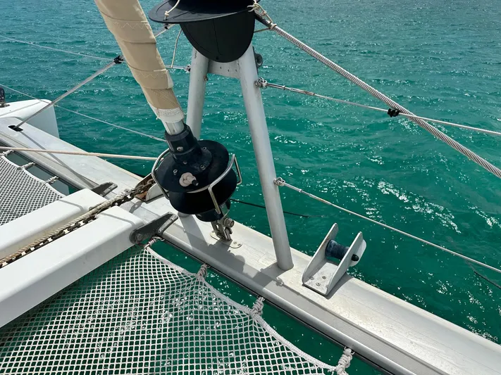  Yacht Photos Pics Lagoon 400 S2 catamaran deck detail with netting, 2014 model, on turquoise water.