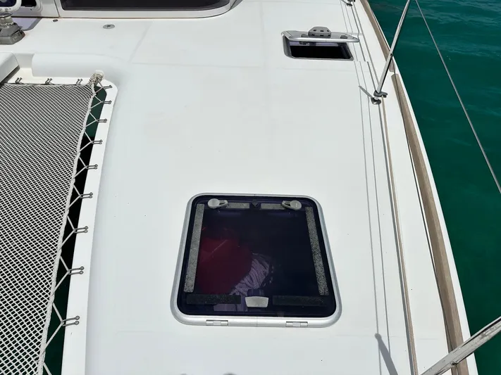  Yacht Photos Pics Deck of 2014 Lagoon 400 S2 catamaran with hatch and netting.
