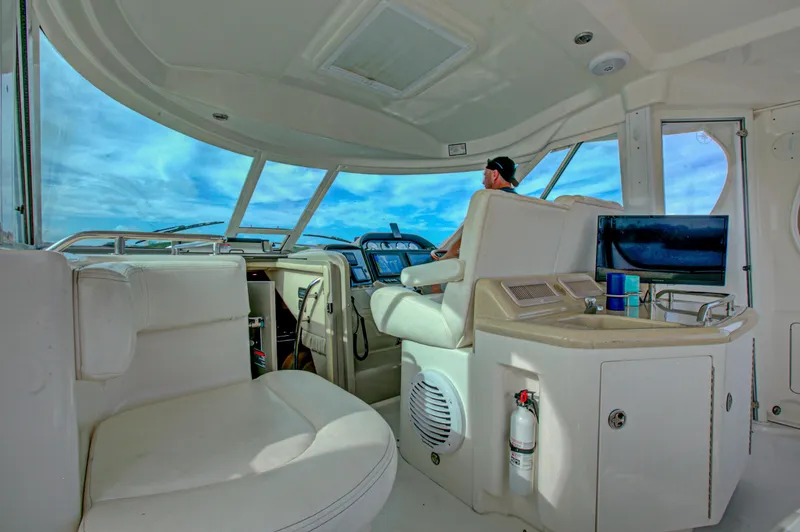 Bula Bula Yacht Photos Pics Interior of 2006 Sea Ray 40 Motor Yacht with modern helm and panoramic windows.
