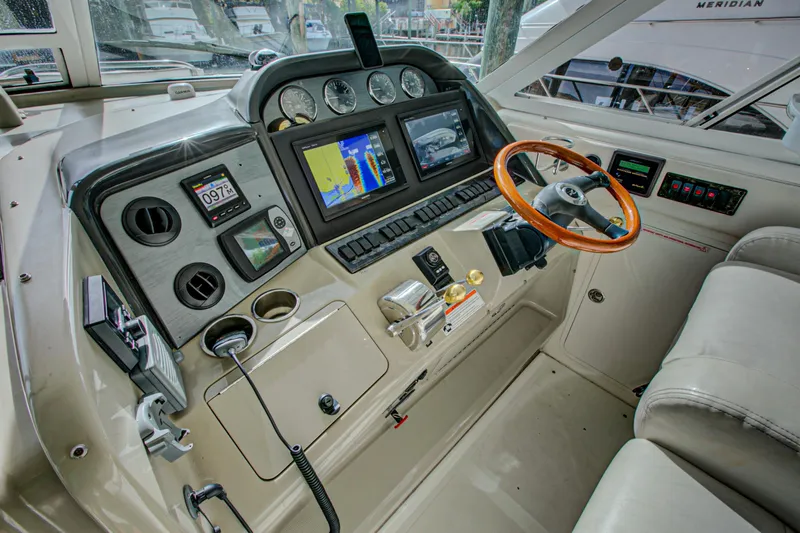 Bula Bula Yacht Photos Pics 2006 Sea Ray 40 Motor Yacht helm with advanced navigation and control systems.