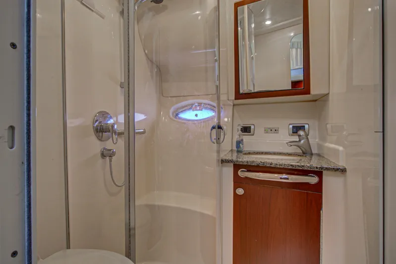 Bula Bula Yacht Photos Pics Luxurious bathroom in 2006 Sea Ray 40 Motor Yacht with shower and vanity.