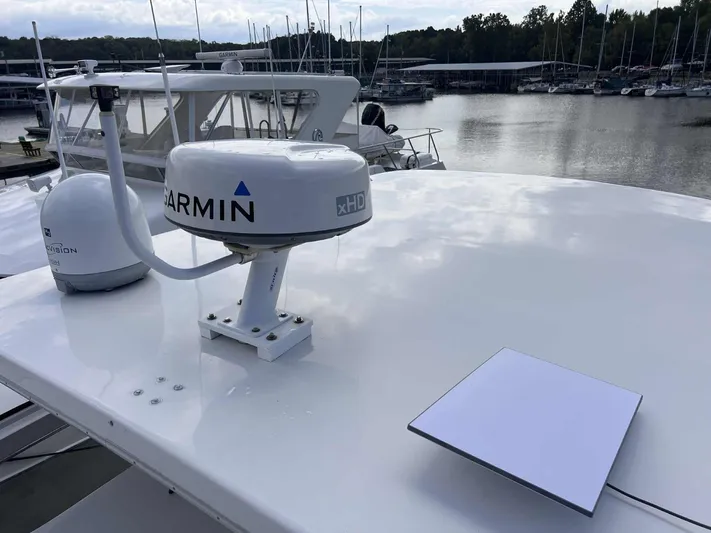 Now Or Never Yacht Photos Pics 1995 Carver 440 Aft Cabin Motor Yacht with Garmin radar at marina.