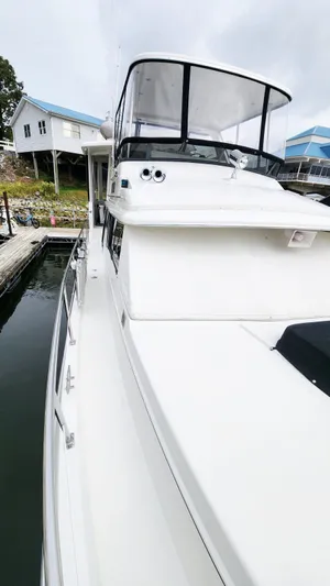 Now Or Never Yacht Photos Pics 1995 Carver 440 Aft Cabin Motor Yacht docked at marina.