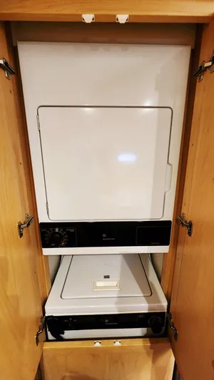 Now Or Never Yacht Photos Pics Stacked washer and dryer in 1995 Carver 440 Aft Cabin Motor Yacht.