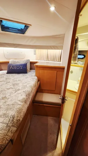 Now Or Never Yacht Photos Pics Cozy cabin interior of 1995 Carver 440 Aft Cabin Motor Yacht with nautical decor.
