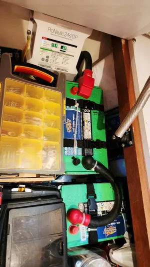 Now Or Never Yacht Photos Pics Battery compartment of 1995 Carver 440 Aft Cabin Motor Yacht with ProNautic charger.