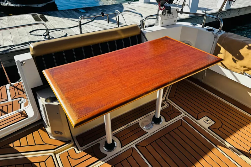 Walrus Yacht Photos Pics 2012 Ranger Tugs R-31 boat with wooden table and stylish deck design.