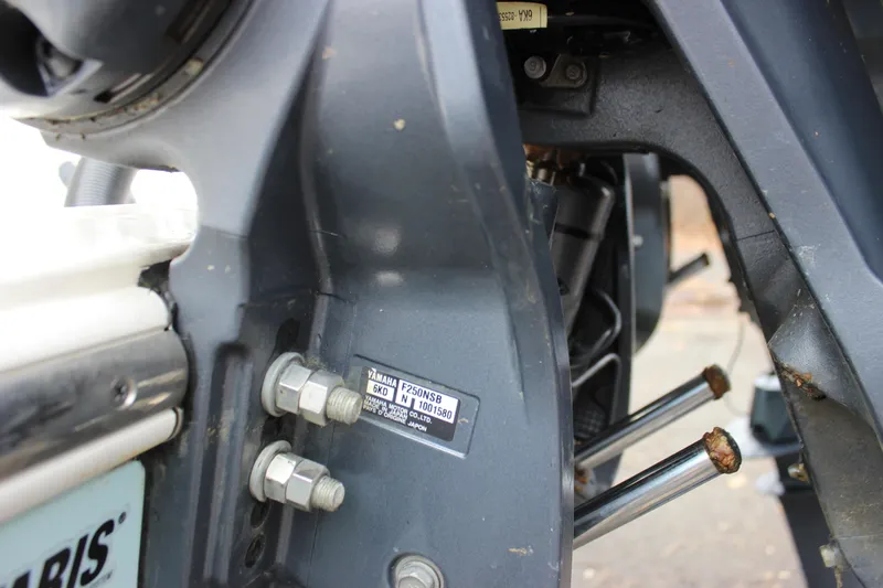  Yacht Photos Pics Close-up of a 2022 Cobia 280 Center Console boat engine components.