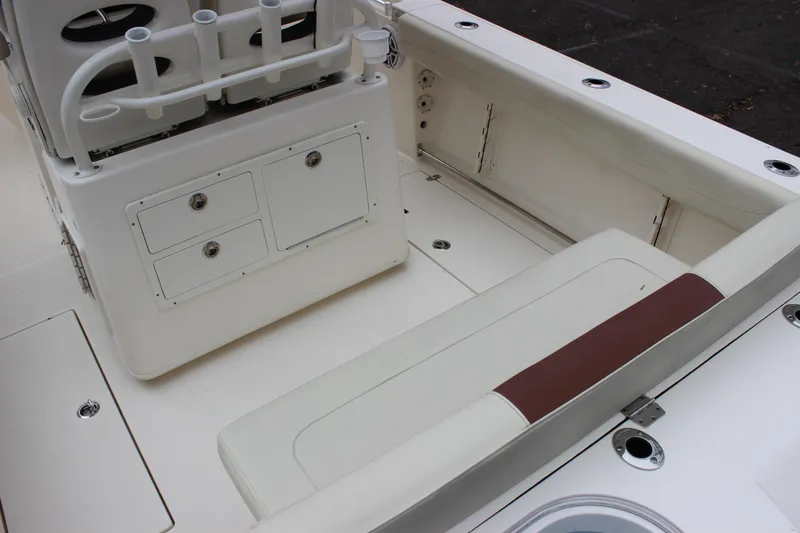  Yacht Photos Pics 2022 Cobia 280 Center Console boat interior with seating and storage compartments.
