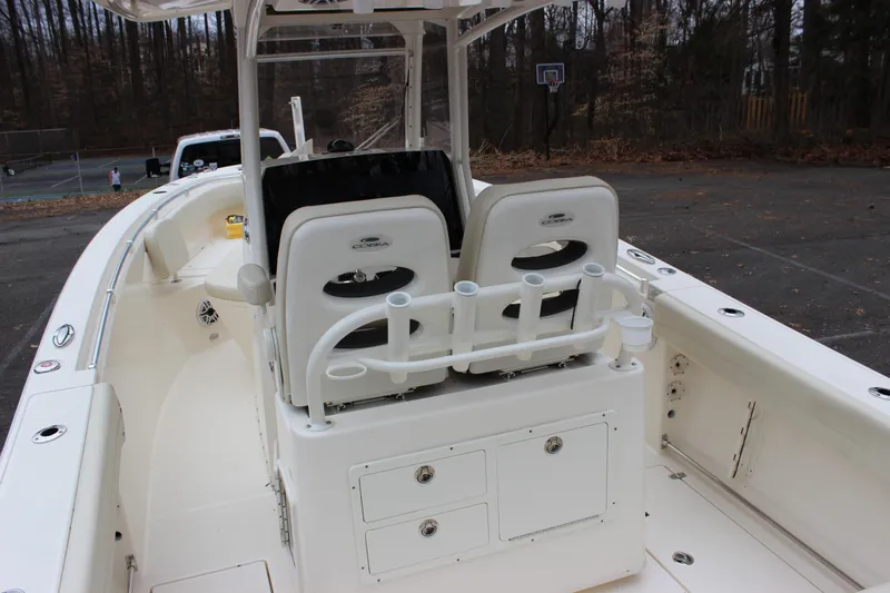  Yacht Photos Pics 2022 Cobia 280 Center Console boat interior with seating and storage compartments.