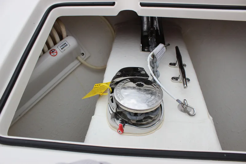  Yacht Photos Pics 2022 Cobia 280 Center Console anchor locker with winch and cleat.