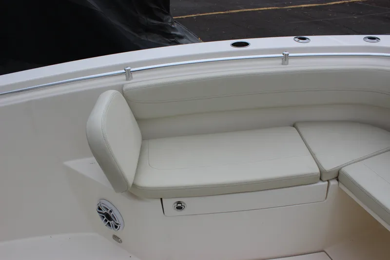  Yacht Photos Pics 2022 Cobia 280 Center Console boat seating area with white cushions.