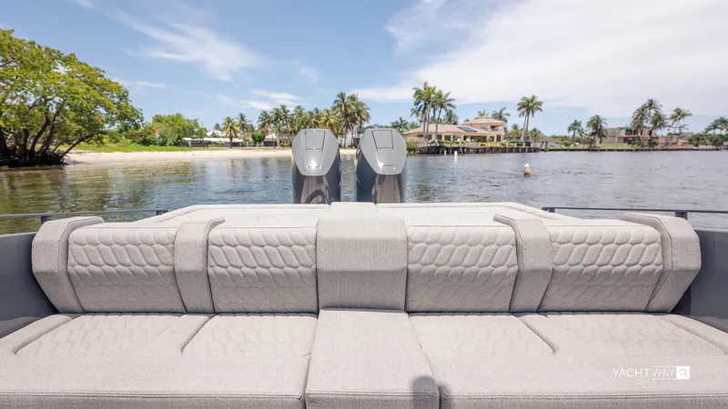New 2025 Skipper 38 Twin Mercury 400 - Sunbed Ed Yacht Photos Pics Luxury Skipper-BSK 38NC boat interior with scenic waterfront view, 2025 model.