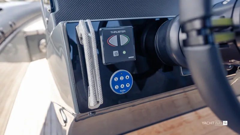 New 2025 Skipper 38 Twin Mercury 400 - Sunbed Ed Yacht Photos Pics Control panel of 2025 Skipper-BSK 38NC yacht, featuring thruster and steering wheel.