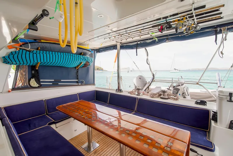  Yacht Photos Pics Spacious 2007 Lagoon 500 yacht interior with seating, table, and ocean view.