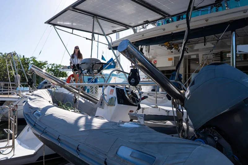 Yacht Photos Pics 2007 Lagoon 500 yacht with solar panels and inflatable boat at marina.