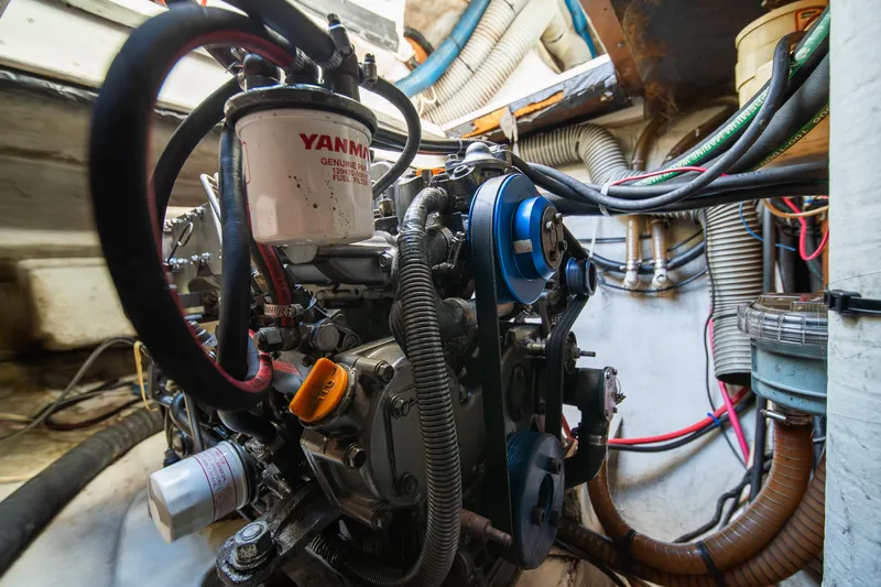  Yacht Photos Pics Engine room of a 2007 Lagoon 500 yacht, featuring Yanmar components and intricate wiring.
