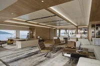 Luxurious yacht interior with modern design, featuring elegant seating and ocean views, Project Raptor 2028.