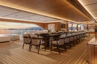 Luxurious yacht interior with elegant dining area, wooden flooring, and sunset view. Custom Project Raptor 2028.
