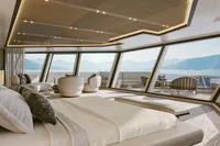 Luxurious yacht interior with panoramic windows, modern furnishings, and scenic ocean views. Custom Project Raptor 2028.