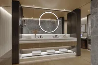 Luxurious modern bathroom with circular mirror, dual sinks, and elegant lighting, Project Raptor 2028 design.