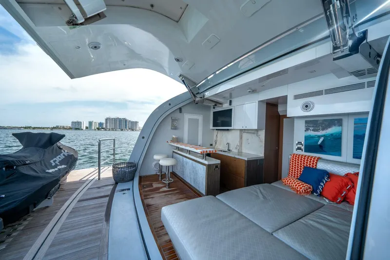 Day One Yacht Photos Pics Luxurious 2020 Hargrave C92 yacht interior with modern kitchen and scenic ocean view.