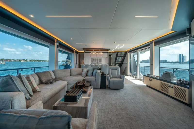Day One Yacht Photos Pics Luxurious interior of 2020 Hargrave C92 yacht with panoramic ocean views and modern furnishings.