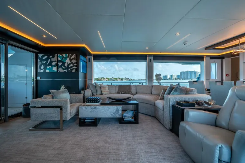 Day One Yacht Photos Pics Luxurious interior of 2020 Hargrave C92 yacht with modern furnishings and ocean view.