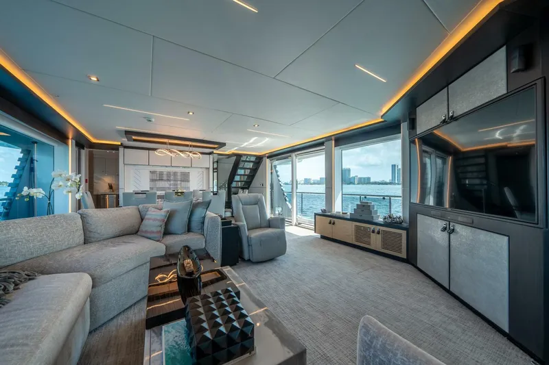 Day One Yacht Photos Pics Luxurious interior of 2020 Hargrave C92 yacht with modern furnishings and ocean view.
