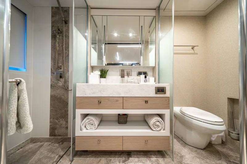 Day One Yacht Photos Pics Luxurious bathroom in 2020 Hargrave C92 yacht with modern fixtures and elegant design.