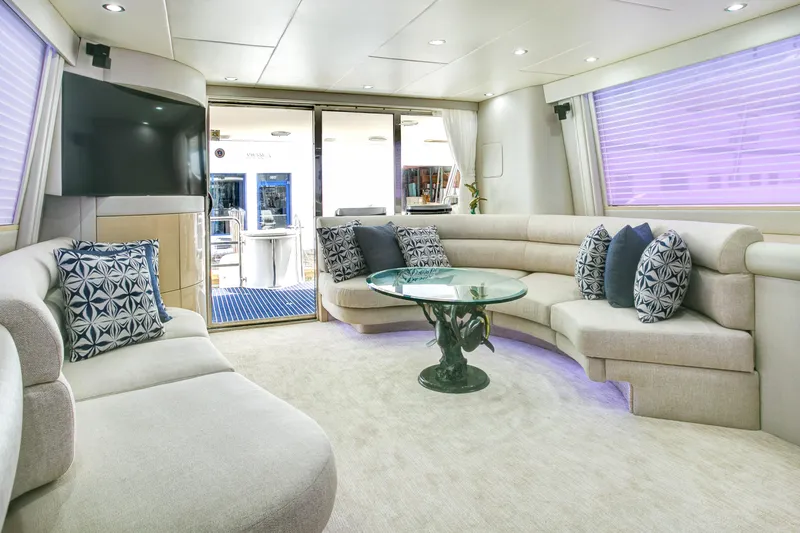 Mautica Yacht Photos Pics Luxurious interior of 1994 Lazzara 76 yacht with elegant seating and modern decor.
