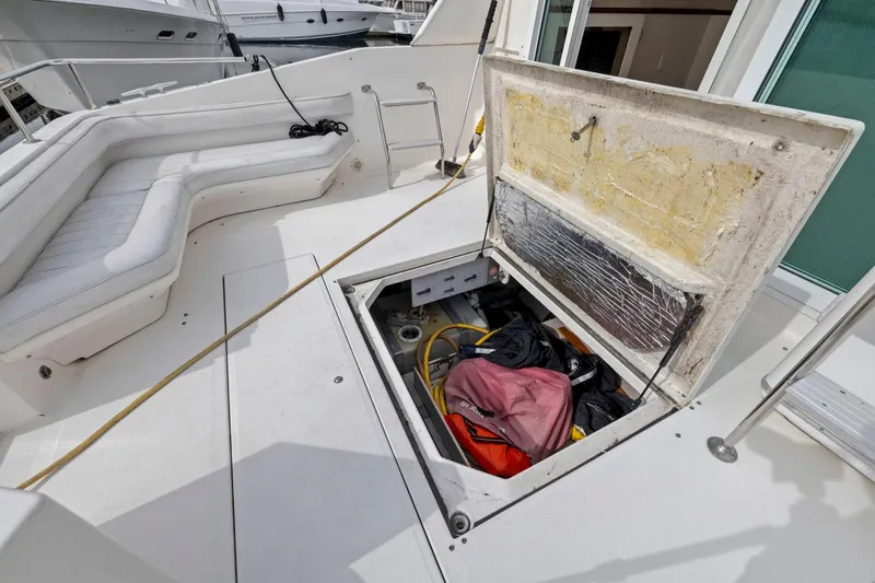  Yacht Photos Pics Open storage compartment on 1994 Sea Ray 550 Sedan Bridge yacht deck.