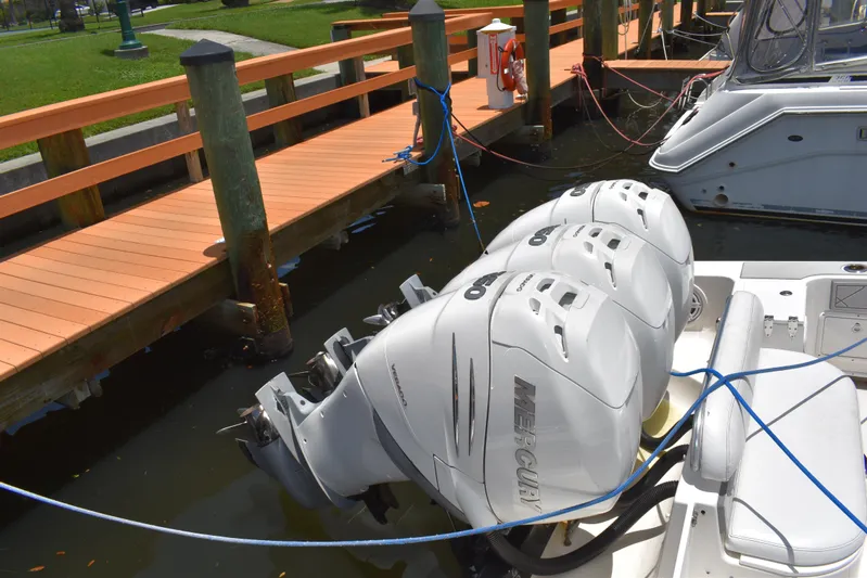 Harry's Dream Yacht Photos Pics 2005 Fountain 38 Sportfish CC Tournament with triple Mercury outboard engines docked.
