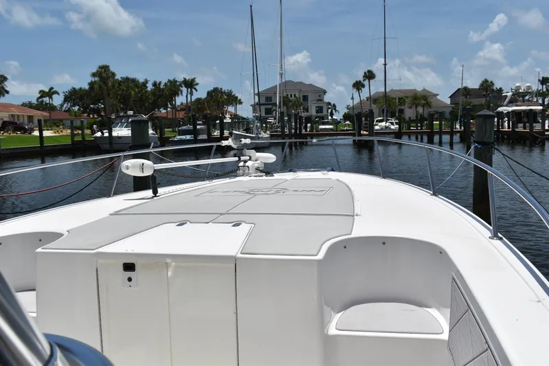 Harry's Dream Yacht Photos Pics 2005 Fountain 38 Sportfish CC Tournament boat docked in a marina under a clear sky.