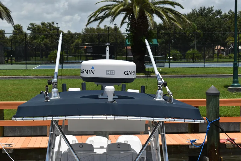 Harry's Dream Yacht Photos Pics 2005 Fountain 38 Sportfish CC Tournament boat with Garmin radar, docked near tennis courts.