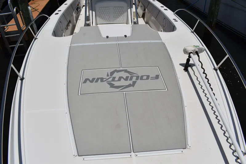 Harry's Dream Yacht Photos Pics 2005 Fountain 38 Sportfish CC Tournament boat deck with logo and railing.