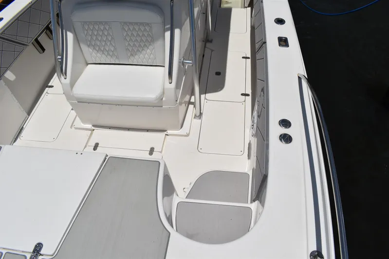 Harry's Dream Yacht Photos Pics 2005 Fountain 38 Sportfish CC Tournament boat interior with white seating and deck layout.