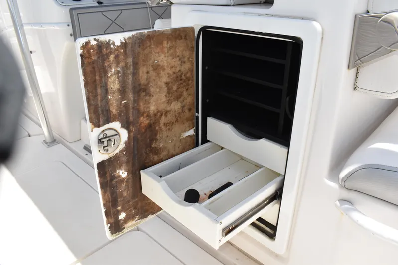 Harry's Dream Yacht Photos Pics Open storage compartment on 2005 Fountain 38 Sportfish CC Tournament boat.