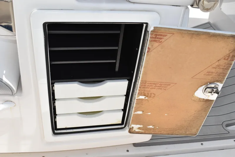 Harry's Dream Yacht Photos Pics Open storage compartment on a 2005 Fountain 38 Sportfish CC Tournament boat.