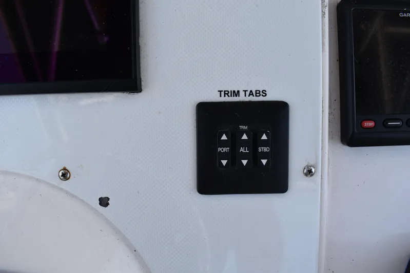 Harry's Dream Yacht Photos Pics Control panel for trim tabs on a 2005 Fountain 38 Sportfish CC Tournament boat.